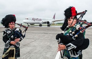 Qatar Airways'  flight to Edinburgh was met with a traditional  Scottish bagpipes
