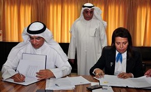 Sheikha Khaled Al-Bahar, NBK Deputy Group Chief Executive Officer  and Bakheet Al-Rashidi, KPI Chief Executive Officer  sign the loan agreement