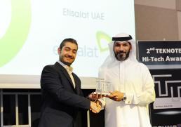 Hassan Hussain, Vice president of Customer Experience, Etisalat receiving the award