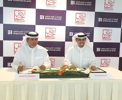 HE Hamad Buamim and Jamal Bin Ghalaita signing the MOU
