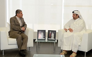 Sheikh Ahmed bin Jassim bin Mohamed Al-Thani with Ali Tayyeb-Nia, Iran's Minister of Economic Affairs and Finance 